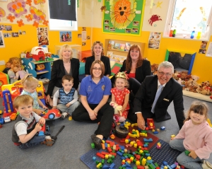 Children from the Happy Days Nursery, Redruth, with (back row, L to R) Sarah Karkeet, Karen Weeks, Donna Simmonds (front row L to R) Manager of Happy Days, Redruth, Vicki Roberts, who achieved a level 3 in learning development as part of the training scheme and Tony Reynolds from the Learning and Skills Council.  